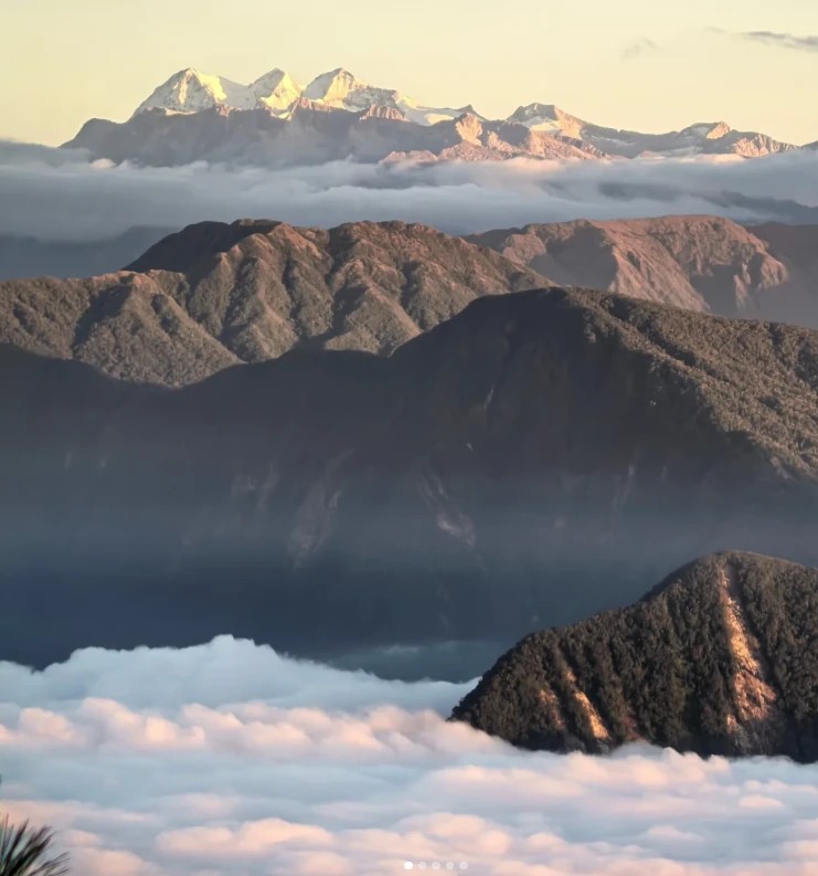 Snow-capped peaks of the Sierra Nevada de Santa Marta seen above the clouds